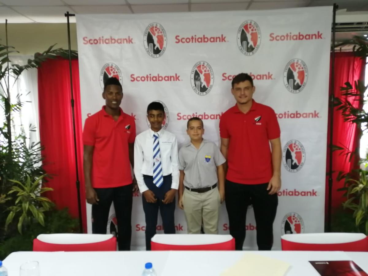 Captain Arshad Harrilal (St. Mary's uniform) and Vice Captain Niall Maingot pose with T&T players Akeal Hosein and Joshua Da Silva at the launch of the Scotiabank NexGen U 15 tournament.