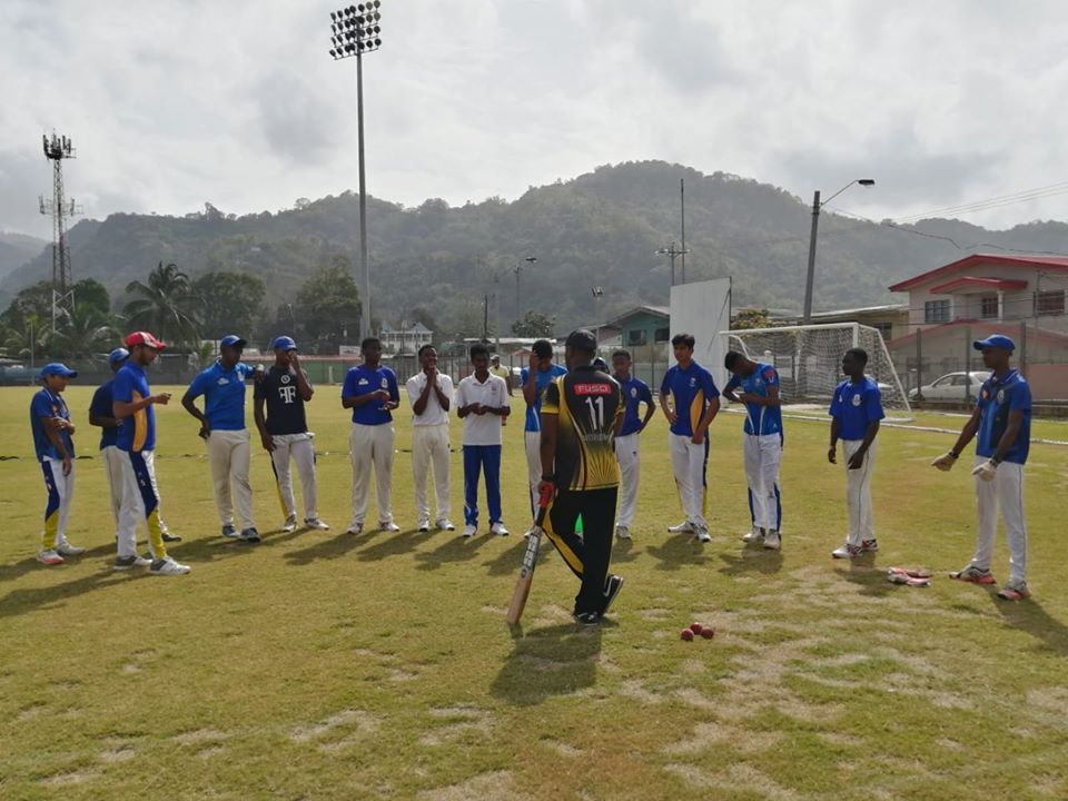 Coach Earnil Ryan chat with U17 team prior to practice game at the Diego Martin Sporting Facility.